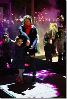 AUCKLAND, NEW ZEALAND - May 13: Members of the public dance at the Square Dance Discotheque silent disco as part of Bright Nights on May 13, 2018 in Auckland, New Zealand. Bright Nights is a three-day festival with light installations illuminating Auckland Harbour.The Square Dance Discotheque is an installation created by Perceptual Engineering (Photo by Dave Simpson/Getty Images)